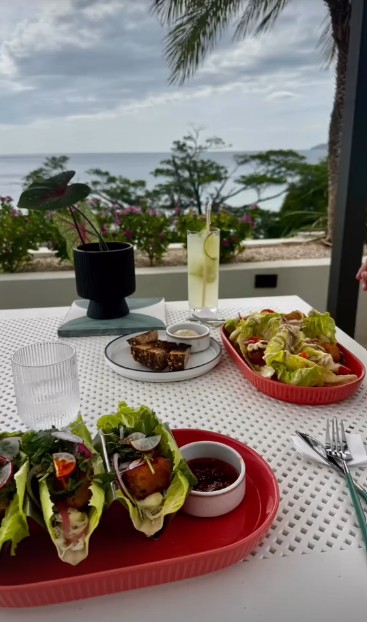 Coastal bites spread on the Naia rooftop, overlooking the Pacific